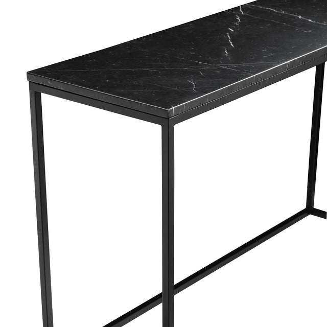 Detail de console noire effet marbre avec plateau rectangulaire et structure metal fine.