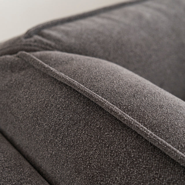 Gros plan sur le tissu gris texture du canape sectionnel moderne.