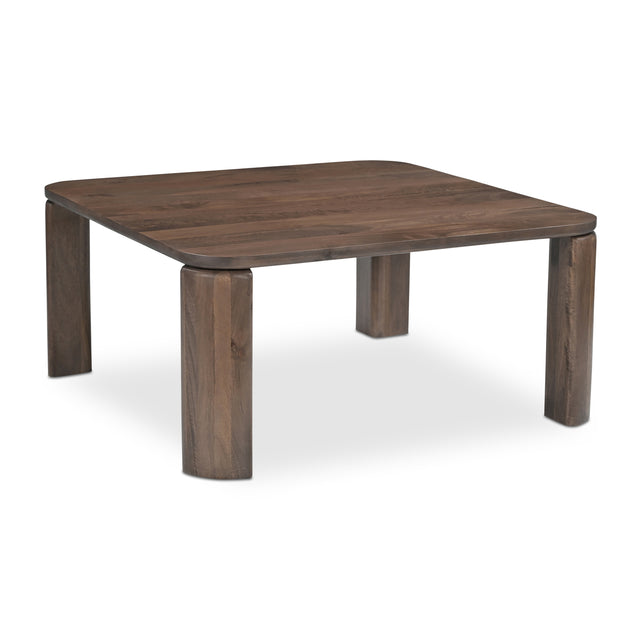 Table basse rectangulaire en bois fonce avec coins arrondis et pieds epais.