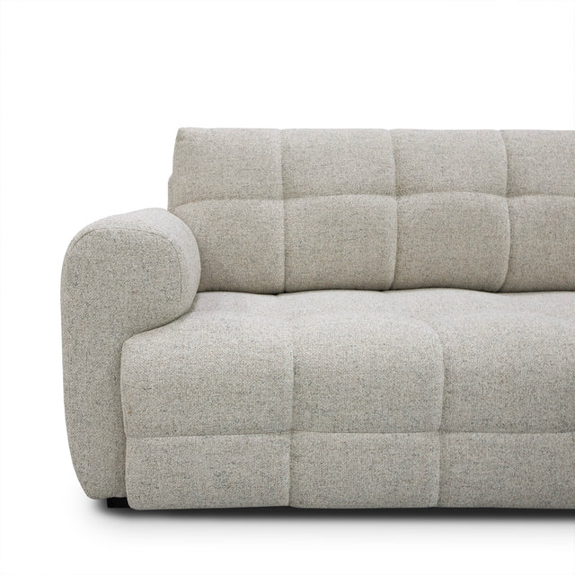 sofa modulaire en tissu terrazzo, design contemporain sur fond blanc.