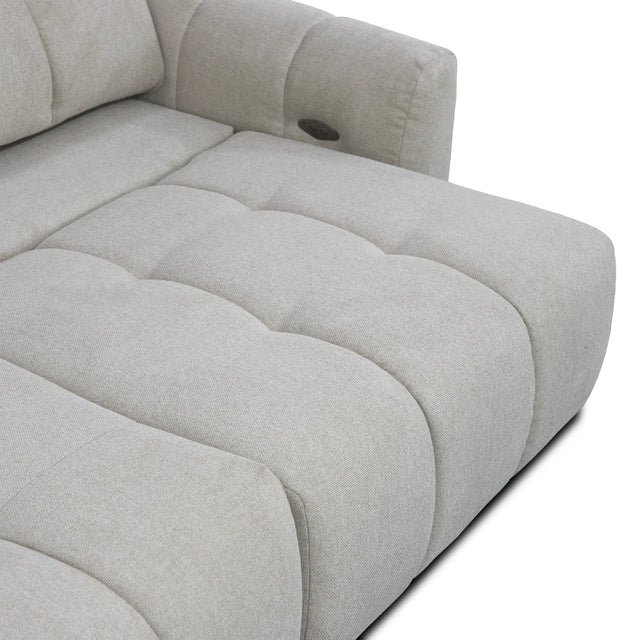 sofa modulaire en tissu gingembre, mécanisme coulissant sur fond blanc.