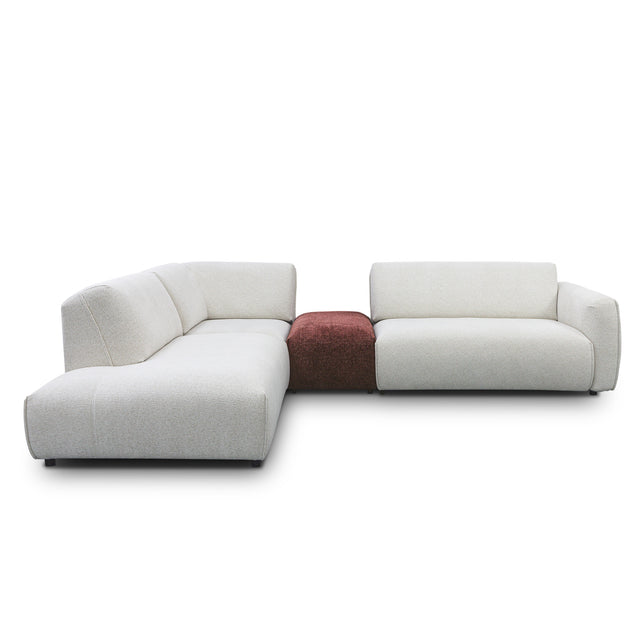 sofa modulaire en tissu crème marbré et tissu bordeau, au design contemporain sur un fond blanc.
