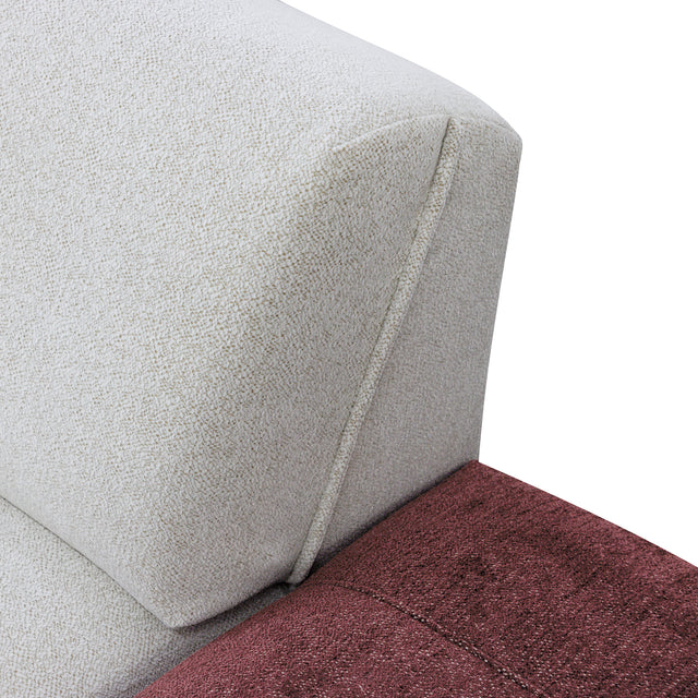 sofa modulaire en tissu crème marbré et tissu bordeau, au design contemporain sur un fond blanc.