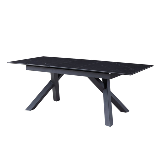 table de salle à manger extensible en céramique noire avec pattes angulaire sur fond blanc