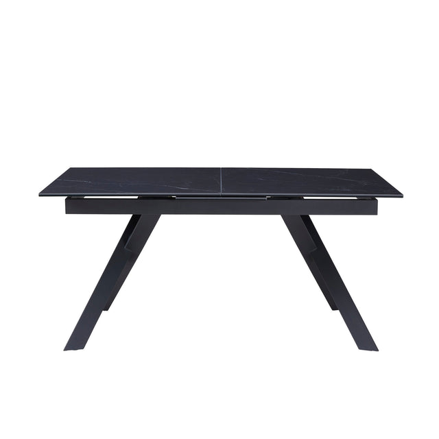 table de salle à manger extensible en céramique noire avec pattes angulaire sur fond blanc