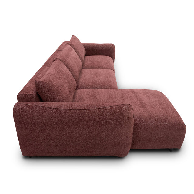sofa modulaire en tissu bordeaux, design contemporain sur fond blanc.