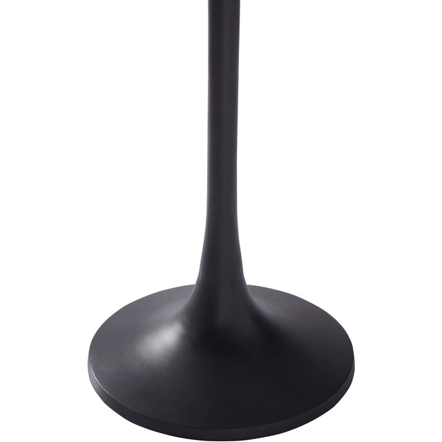 Base arrondie noire en métal d’une table d’appoint au design moderne avec pied central fuselé.