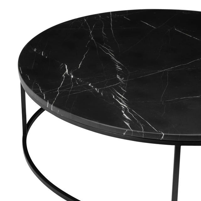 Plateau rond noir effet marbre avec veines blanches et structure metal fine moderne.