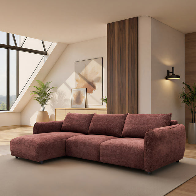 sofa modulaire en tissu bordeaux, design contemporain, installé dans un salon moderne et lumineux avec décoration épurée.