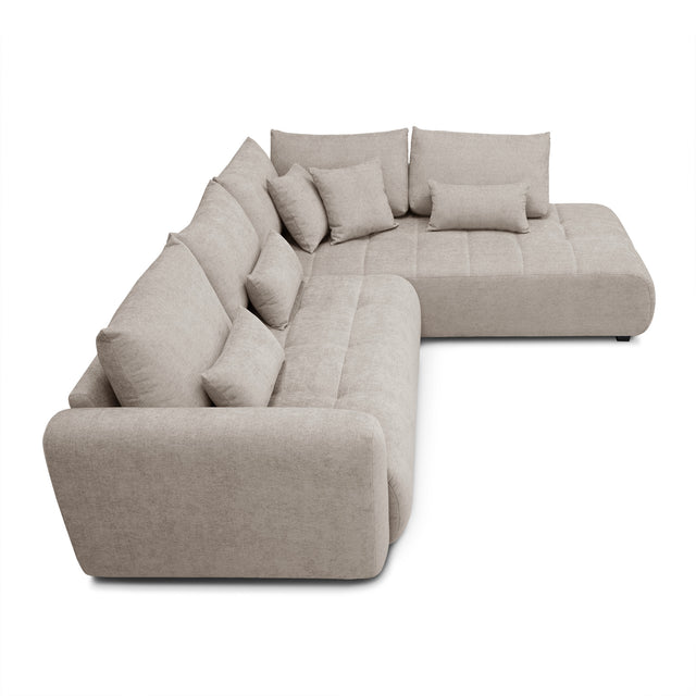 sofa modulaire en tissu sable fin, design contemporain sur fond blanc.