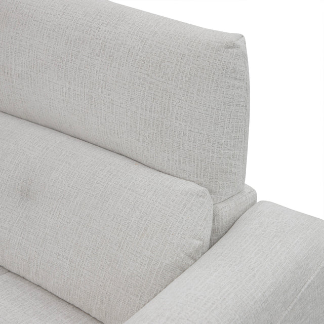 sofa modulaire en tissu givré greige, design contemporain sur fond blanc.