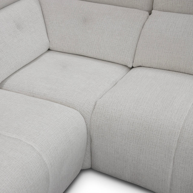 sofa modulaire en tissu givré greige, design contemporain sur fond blanc.