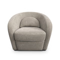 Fauteuil arrondi en tissu beige motif pied-de-poule, design contemporain sur fond neutre.