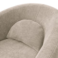 Fauteuil arrondi en tissu beige uni avec coussin, design moderne sur fond neutre.