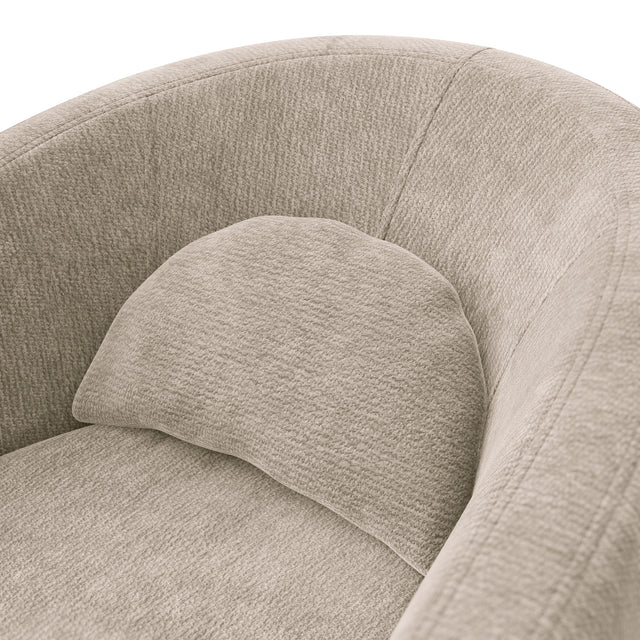 Fauteuil arrondi en tissu beige uni avec coussin, design moderne sur fond neutre.