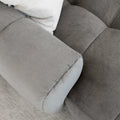 Sectionnel en velours côtelé brun avec assise profonde, design moderne dans un salon épuré.