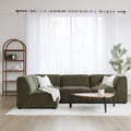 Sectionnel en tissu vert olive avec méridienne gauche, au design arrondi et contemporain dans un salon lumineux.