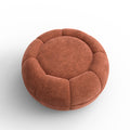 Pouf rond terracotta en tissu, vue dessus, design capitonné pour présentation produit.
