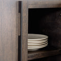 Buffet de rangement en bois foncé à quatre portes, design contemporain avec poignées intégrées et lignes épurées.