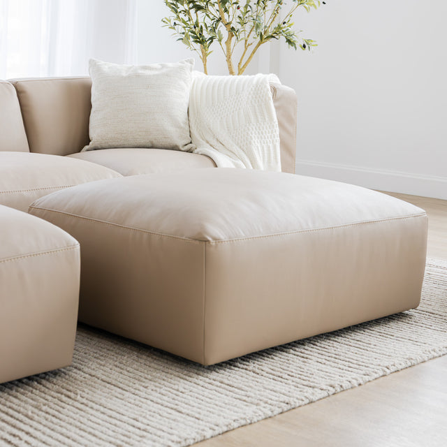 repose pied en cuir beige