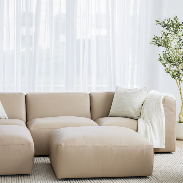repose pied en cuir beige