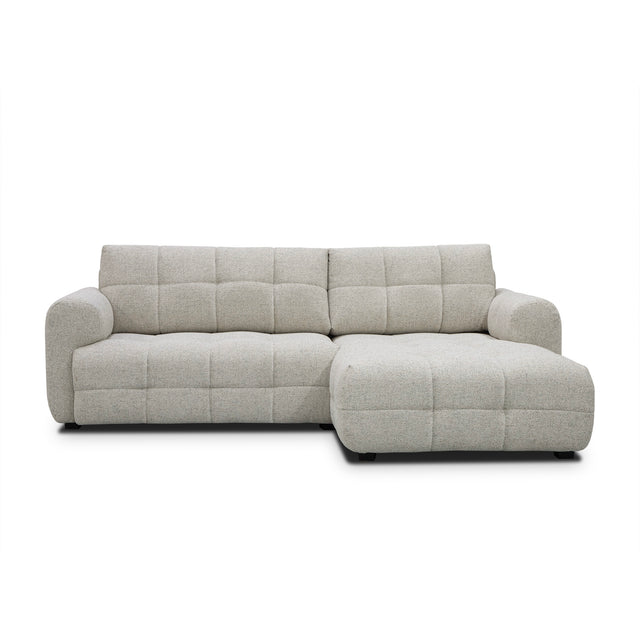 sofa modulaire en tissu terrazzo, design contemporain sur fond blanc.