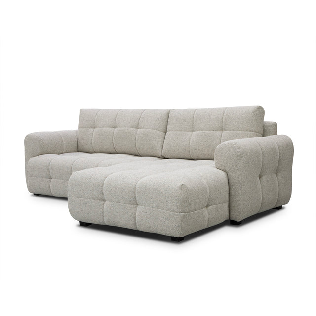 sofa modulaire en tissu terrazzo, design contemporain sur fond blanc.