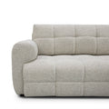 sofa modulaire en tissu terrazzo, design contemporain sur fond blanc.