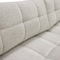 sofa modulaire en tissu terrazzo, design contemporain sur fond blanc.