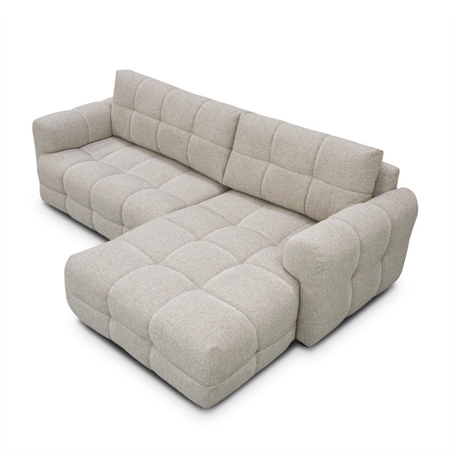 sofa modulaire en tissu terrazzo, design contemporain, sur fond blanc.