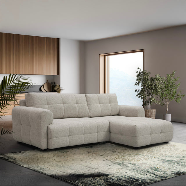 sofa modulaire en tissu terrazzo, design contemporain, installé dans un salon lumineux et épuré.