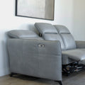 Canape inclinable avec chaise longue droite en cuir gris clair avec pieds noirs.