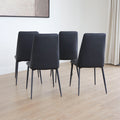 Ensemble de chaises noires modernes a pieds fins en metal.