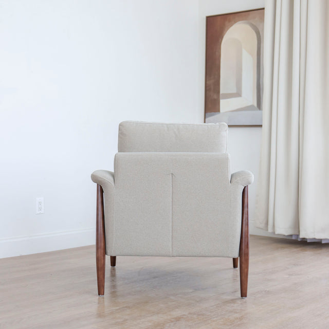 Fauteuil Arnold en tissu sable feutré