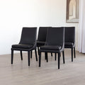 Ensemble de 4 chaises de cuisine SINATRA en cuir végane noir avec coutures assorties blanche avec les pattes en bois noir