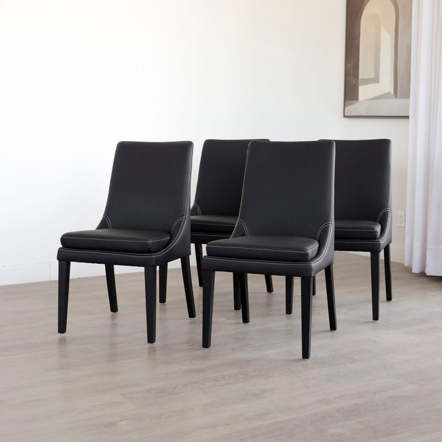 Ensemble de 4 chaises de cuisine SINATRA en cuir végane noir avec coutures assorties blanche avec les pattes en bois noir