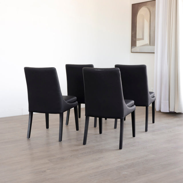 Ensemble de 4 chaises de cuisine SINATRA en cuir végane noir avec coutures assorties blanche avec les pattes en bois noir