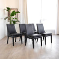 Ensemble de 5 chaises de cuisine SINATRA en cuir végane noir avec coutures assorties blanche avec les pattes en bois noir