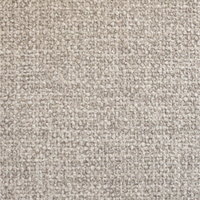Texture tissu beige pour ottoman, maille épaisse et résistante adaptée à un salon moderne.