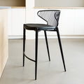 Tabouret de bar noir avec assise rembourrée et dossier ajouré design, idéal pour cuisine moderne.