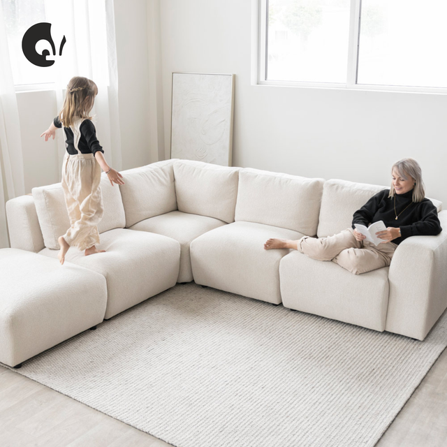 Henri modular sofa in sand-colored bouclé fabric