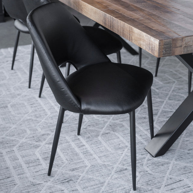 chaise de cuisine en cuir noir et pietement acier noir